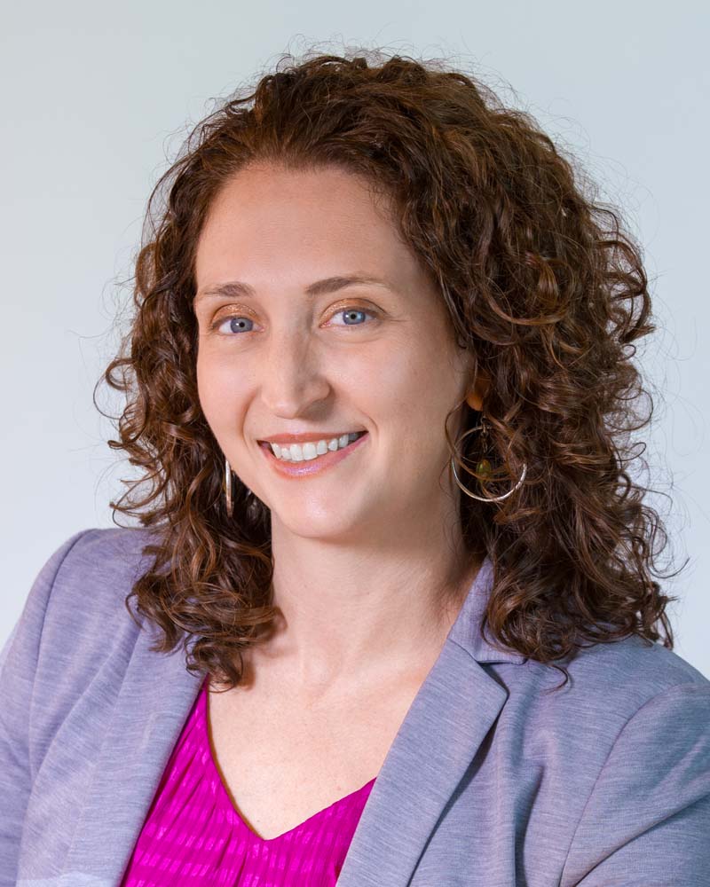 Image: Headshot of Jenny Crook in a circular crop