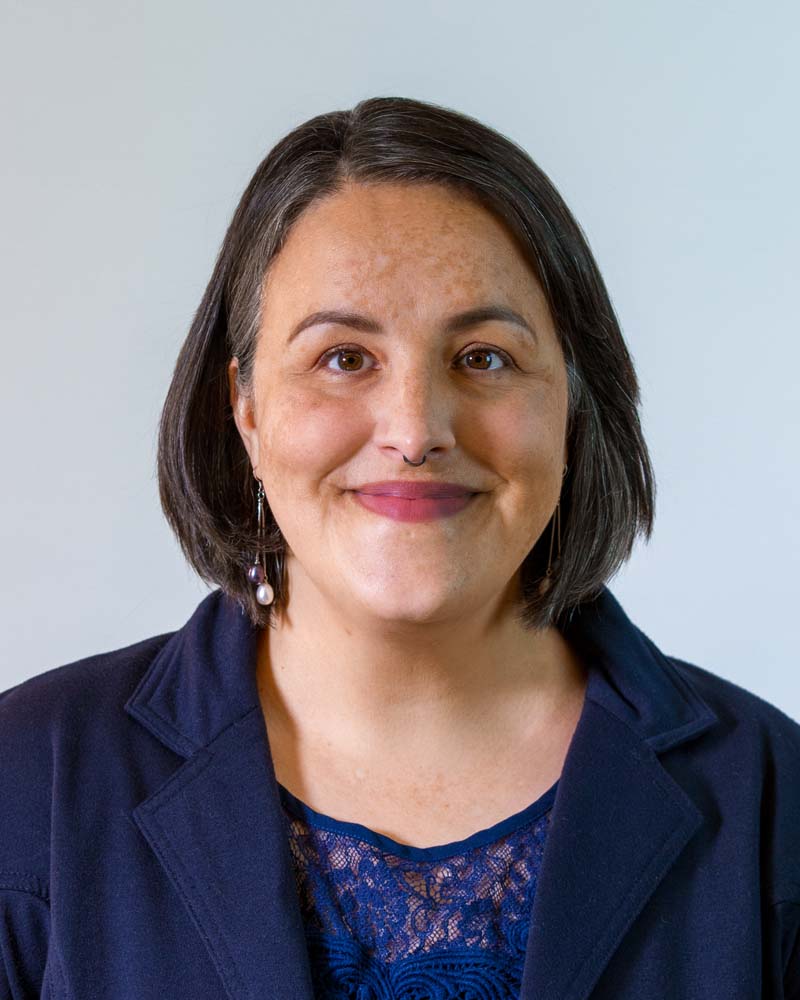 Image: Headshot of Jenny Crook in a circular crop