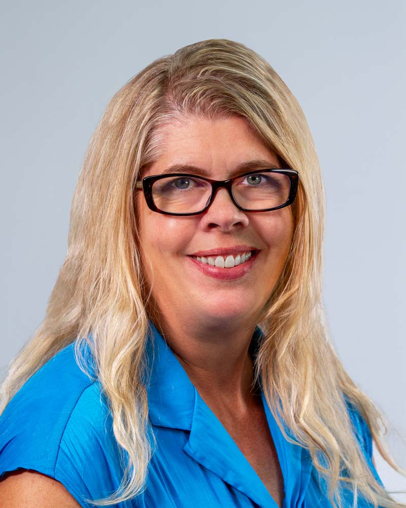 Image: Headshot of Monica Zumack in a circular crop