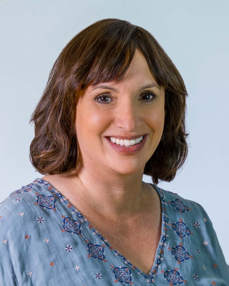 Image: Headshot of Jenny Crook in a circular crop