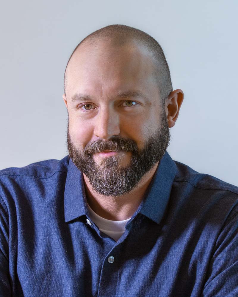 Image: Headshot of Rob Van Oss in a circular crop