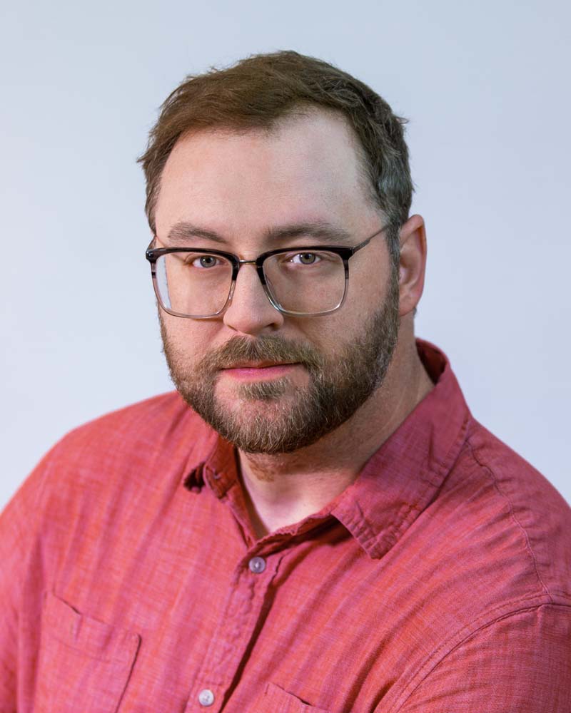 Image: Headshot of Rob Van Oss in a circular crop