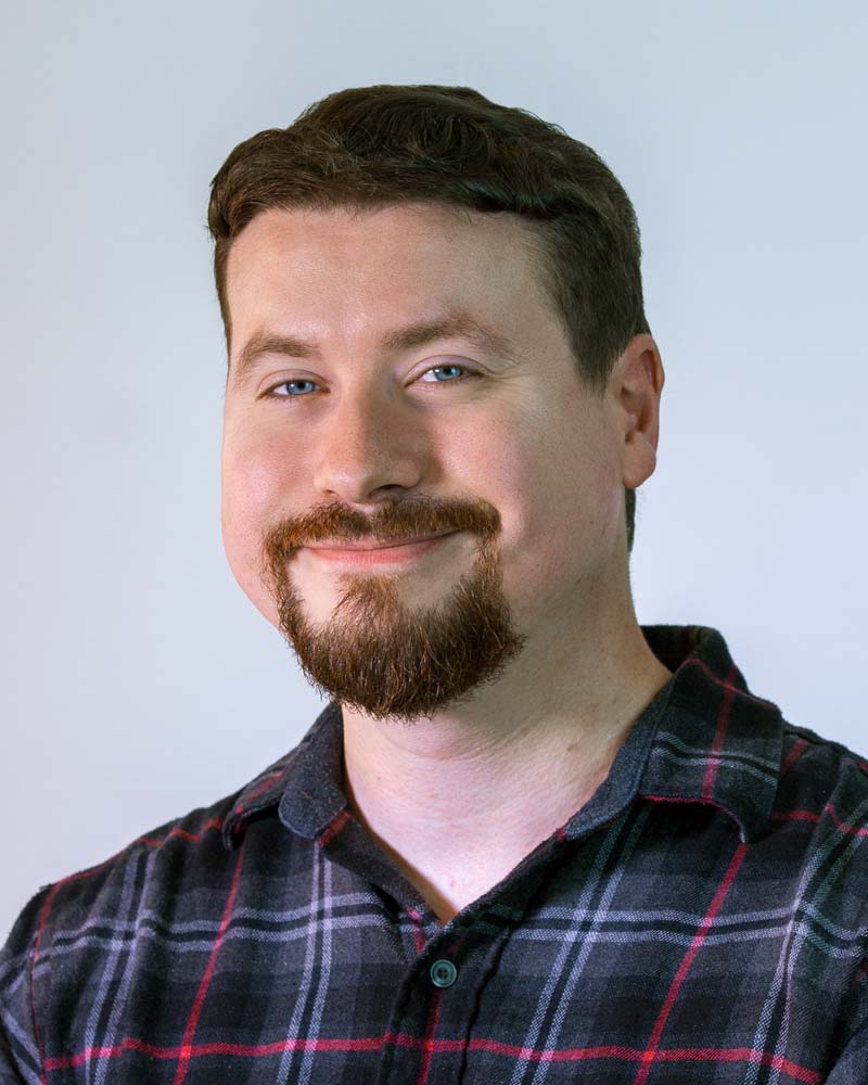 Image: Headshot of Tyler Talcott in a circular crop