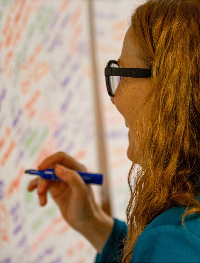 Woman at Whiteboard.