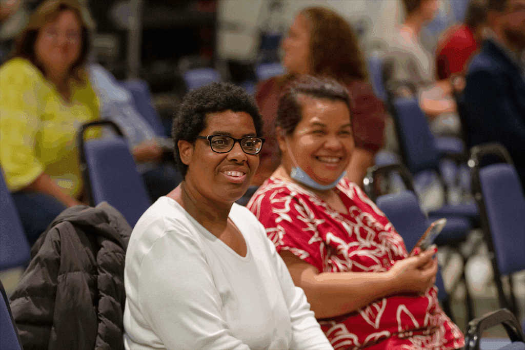 Happy attendees at a Wise training conference.